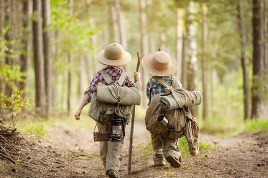 What are the potential health effects of carrying a heavy backpack?