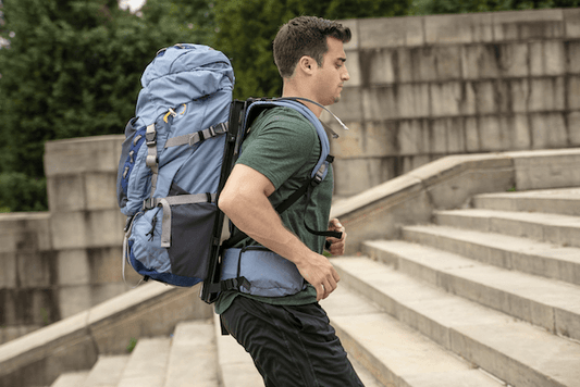 How can I carry a heavy backpack more easily?